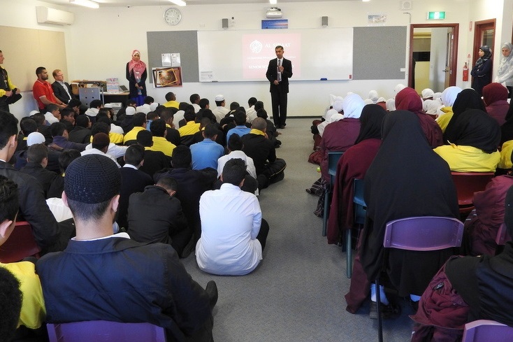 Head of Secondary School Mr Vis addressing the students in the Senior Assembly Hall