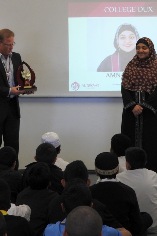 Mr Houghton presenting Amnah Arain (2015 Year 12 VCE Graduate) with the prestigeous DUX Award