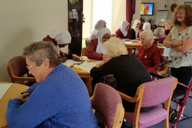 Year 7 Students doing Art with the Elderly