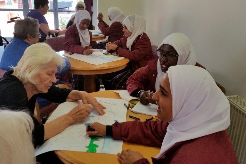 Year 7 Students doing Art with the Elderly