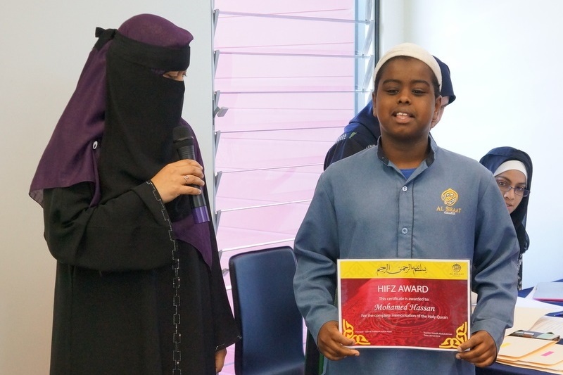 Mohamed A. Hassan receiving his Hifz Award