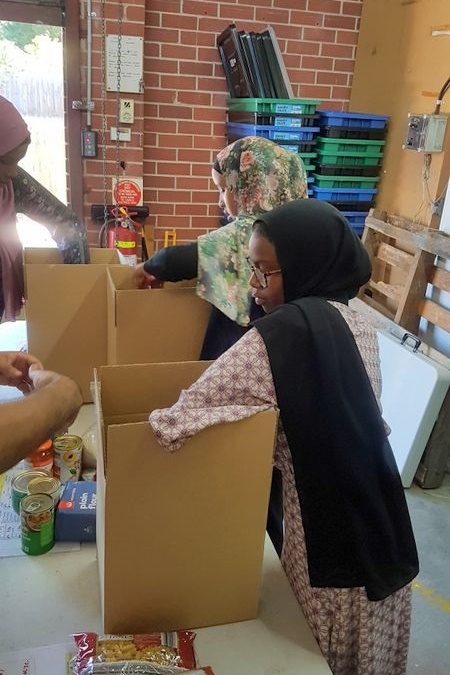 SRC Girls Volunteering for Halal Food Bank