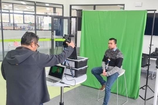 Teachers  using Green Screen for digital content