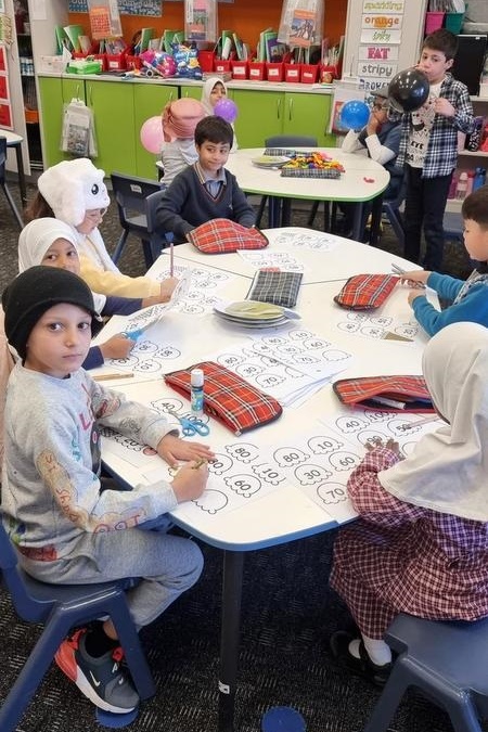 Year 1s celebrating their 100th Day of School